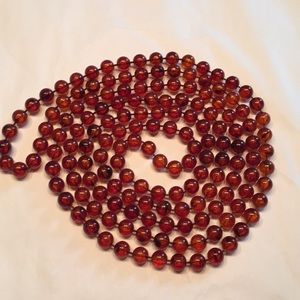 Vintage faux amber 3/8”d super long66” necklace